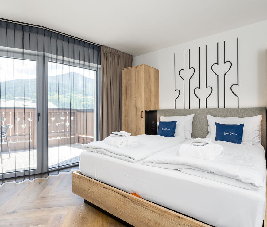 The Gast House Zell am See | 2 Schlafzimmer Deluxe Suite mit private Sauna