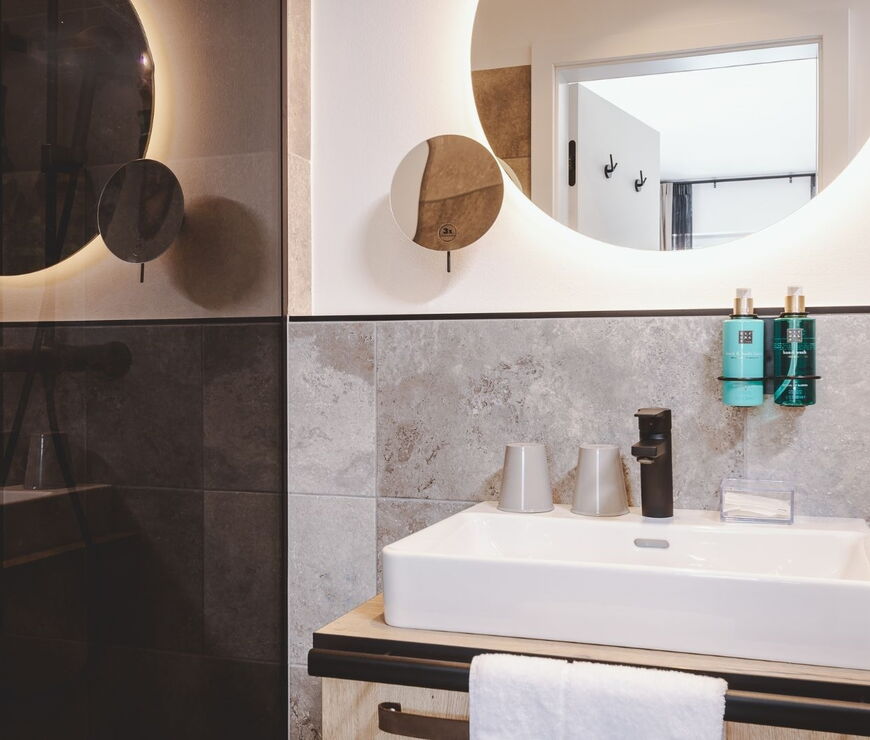 The Gast House Zell am See | 2 Schlafzimmer Deluxe Suite mit private Sauna